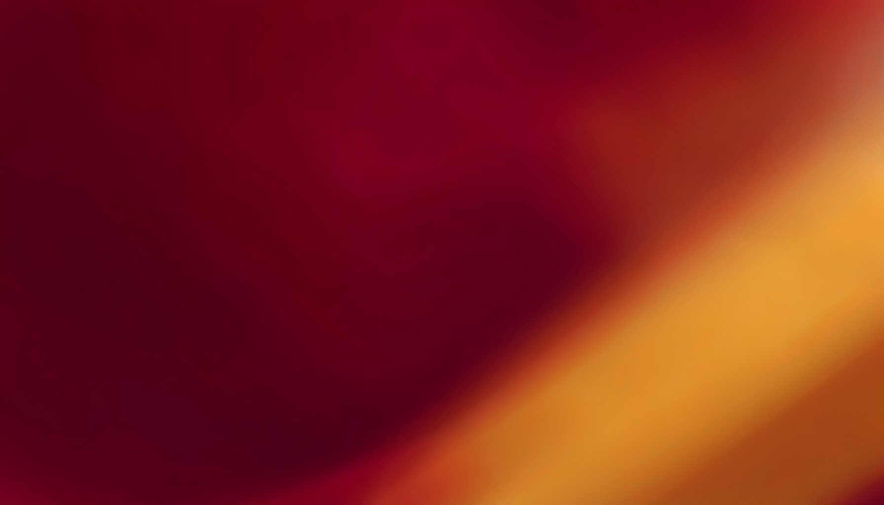 Small abstract banner with deep crimson and amber tones